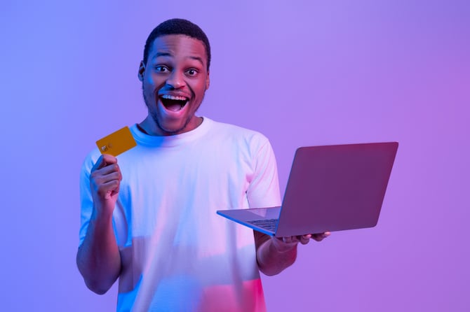 online-shopping-portraif-of-jjoyful-black-man-wit-2023-11-27-05-25-51-utc